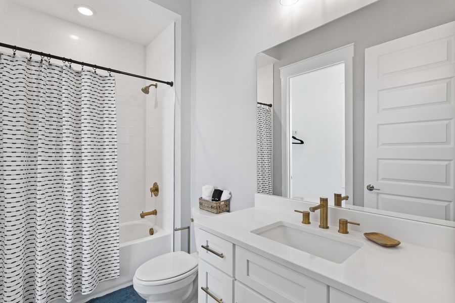 Representative furnished interior of a home built from the The Heron 20 by Brock Built in Twin Palms, Inlet Beach (Image 46).