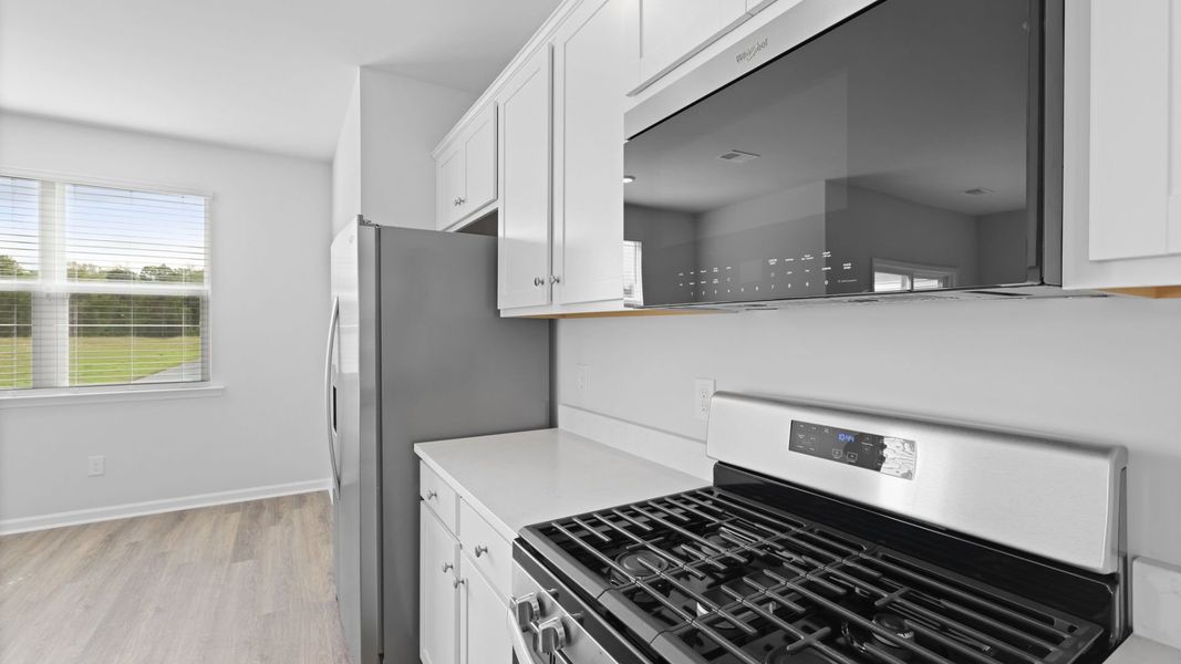Representative furnished interior of a home built from the SALEM by D.R. Horton in Carolina Groves, Moncks Corner (Image 5).