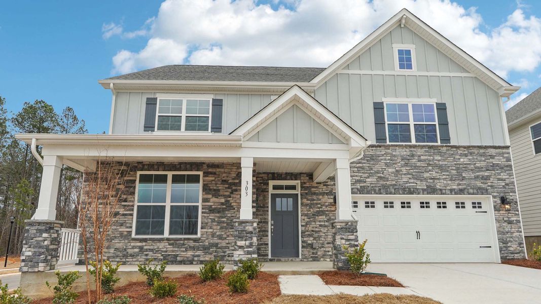 Front exterior of a new home in Westport, York, SC, highlighting curb appeal (Image 1). Front exterior of a new home in Westport, York, SC, highlighting curb appeal (Image 1).