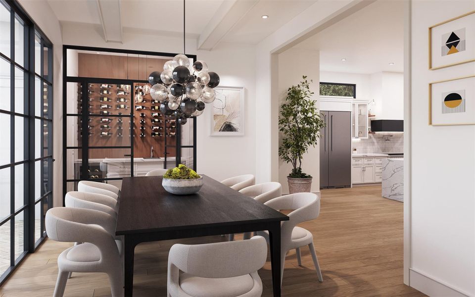 The dining room is a sophisticated blend of modern design and warm, livable comfort.  The Beamed Ceiling and the sculptural glass pendent chandelier becomes an artistic focal point, casting a gentle glow and adding movement and dimension to the room.  Beyond the glass, a beautifully integrated wine room introduces both function and visual intrigue.  Light wood flooring adds warmth underfoot, balancing the darker elements.  The Multi-Slide Panel Door offers effortless access to the Cigar Terrace.