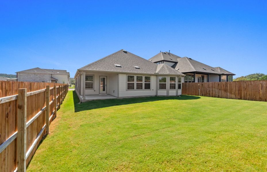Exterior details and patio area of a home in Saddleback at Santa Rita Ranch, Liberty Hill (Image 20). Exterior details and patio area of a home in Saddleback at Santa Rita Ranch, Liberty Hill (Image 20).