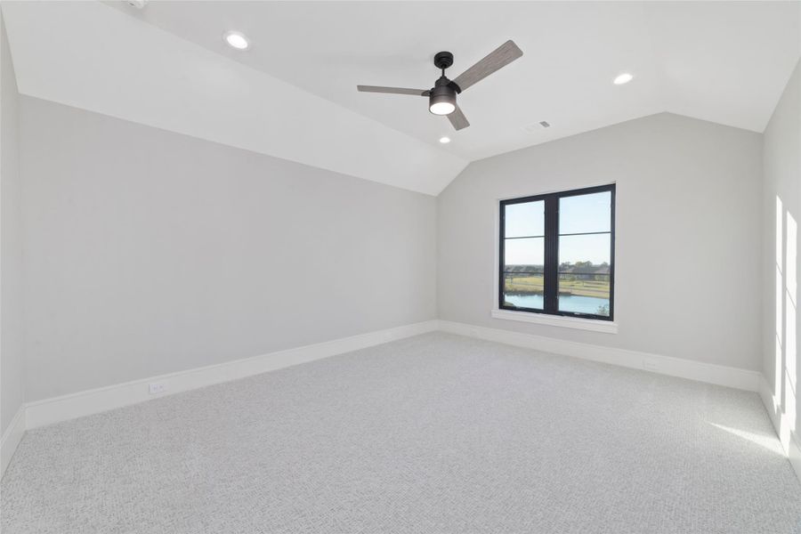 Spacious additional upstairs bedroom with clean contemporary design. Perfect for guest privacy or for grandchildren!