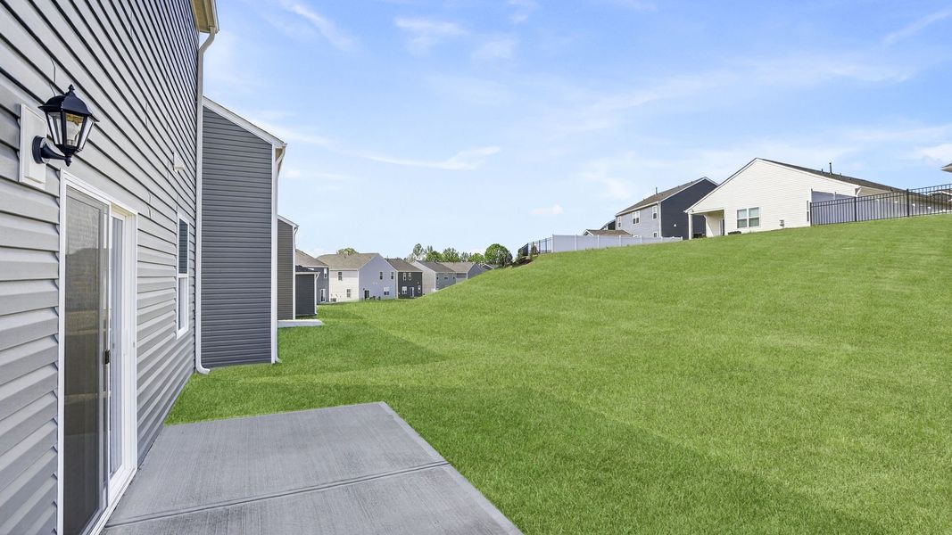 Exterior details and patio area of a home in Hunters Ridge, Woodruff (Image 20).