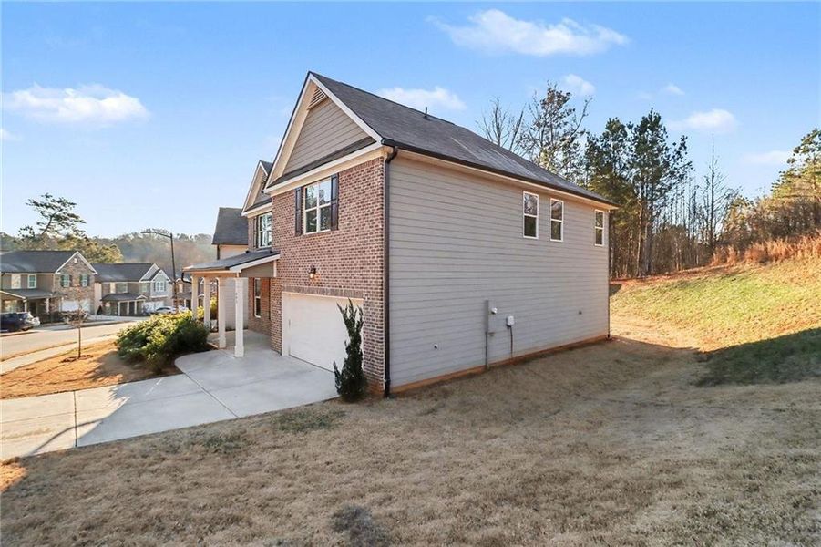 Exterior details and patio area of a home in , Atlanta (Image 36).