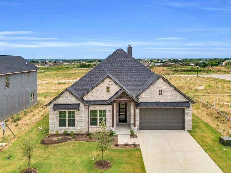 Front exterior of a new home in , Venus, TX, highlighting curb appeal (Image 19).