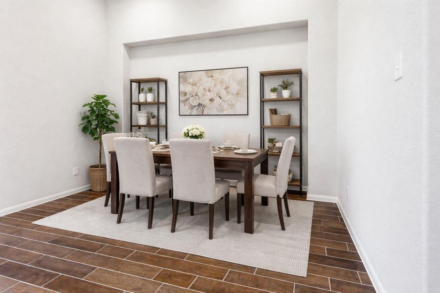 Dedicated dining area with a clean and open design, ideal for everyday meals or special occasions, perfectly positioned just off the kitchen for convenience and flow. **Virtually Staged** Dedicated dining area with a clean and open design, ideal for everyday meals or special occasions, perfectly positioned just off the kitchen for convenience and flow. **Virtually Staged**
