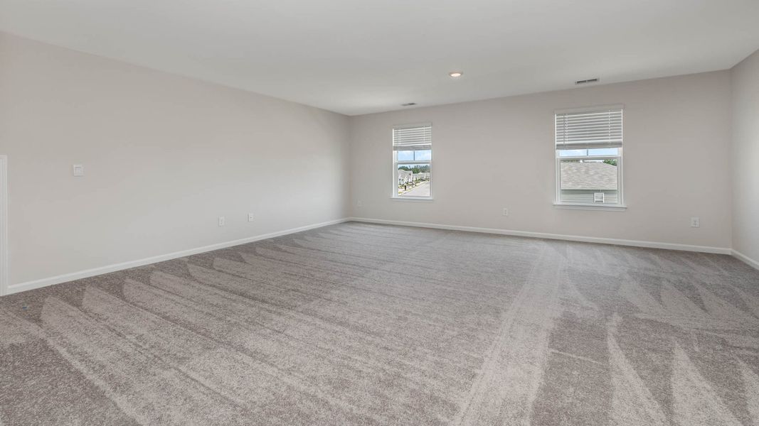 Representative unfurnished interior of a home built from the WREN by D.R. Horton in Cedar Hill Landing, Navassa (Image 24).