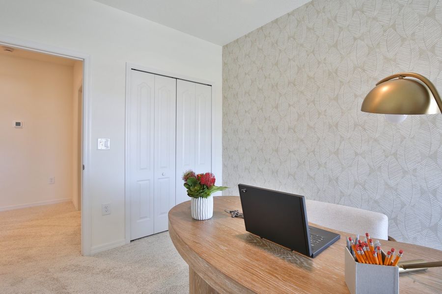 Representative furnished interior of a home built from the Morgan by Neal Communities in SkySail, Naples (Image 8).