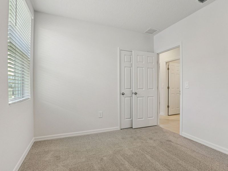 Spacious, unfurnished interior of a new home in Springs at Lake Alfred - Classic Series, Lake Alfred (Image 11).