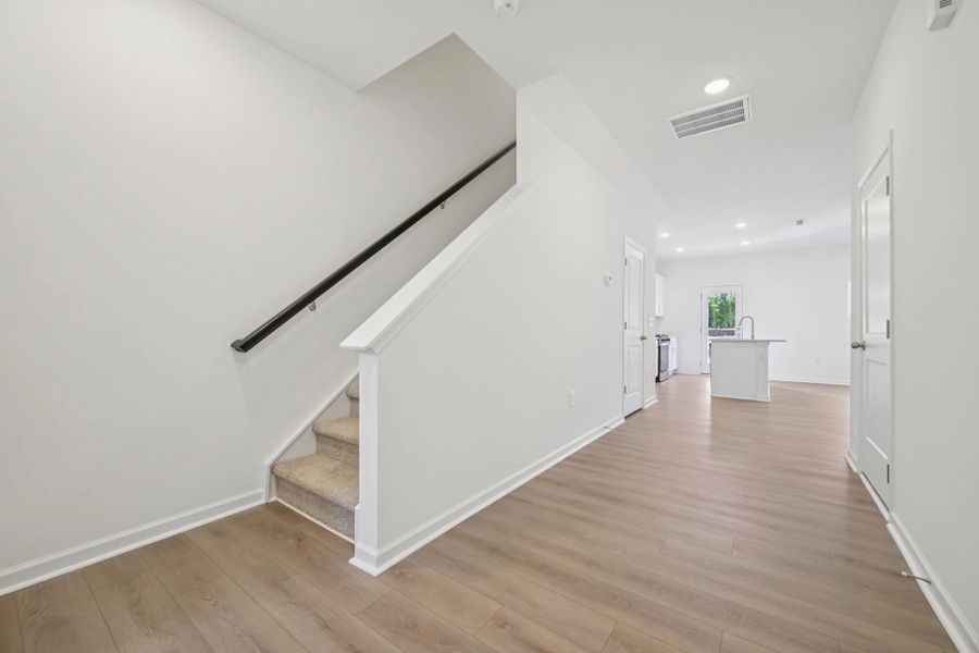 Foyer featuring the AW Collection® Timeless - A refined welcome with soft light and style.