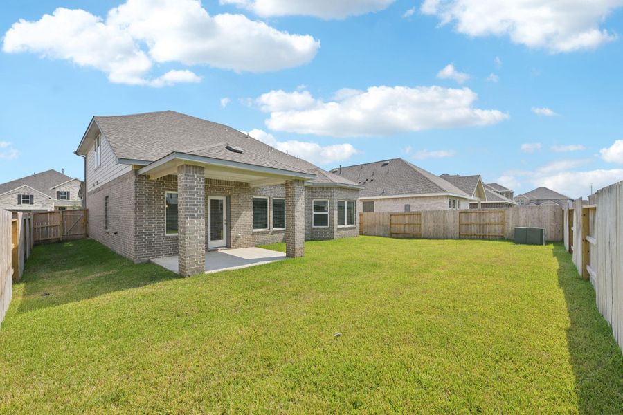 Exterior details and patio area of a home in Kingdom Heights, Rosenberg (Image 26). Exterior details and patio area of a home in Kingdom Heights, Rosenberg (Image 26).