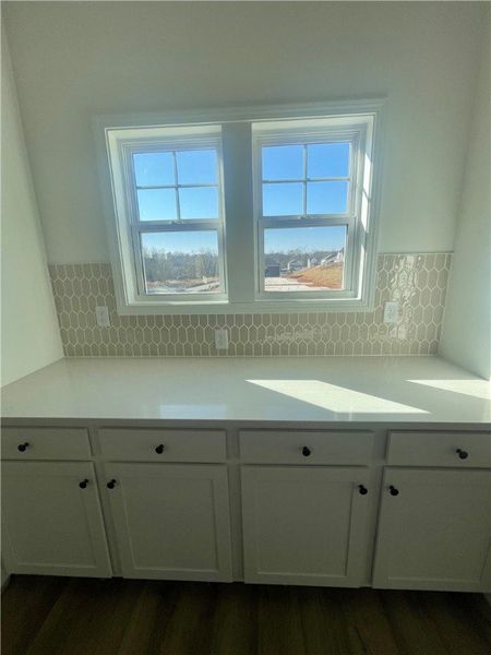 Furnished interior view inside a new home in Springwood Grove, Central (Image 7).