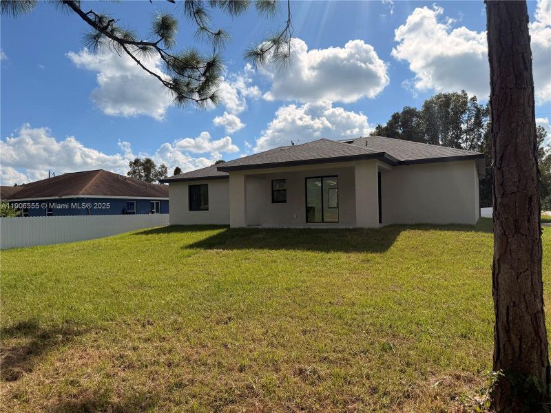 Exterior details and patio area of a home in , Lehigh Acres (Image 25).