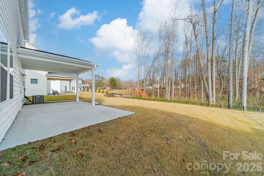 Exterior details and patio area of a home in Stewarts Landing, Charlotte (Image 23).