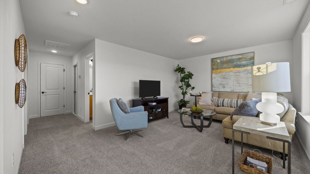 Representative furnished interior of a home built from the Victoria by Epcon Communities in Village at Maple Leaf Farm, King (Image 18).