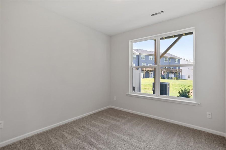Spacious, unfurnished interior of a new home in Sweetbrier, Durham (Image 31).