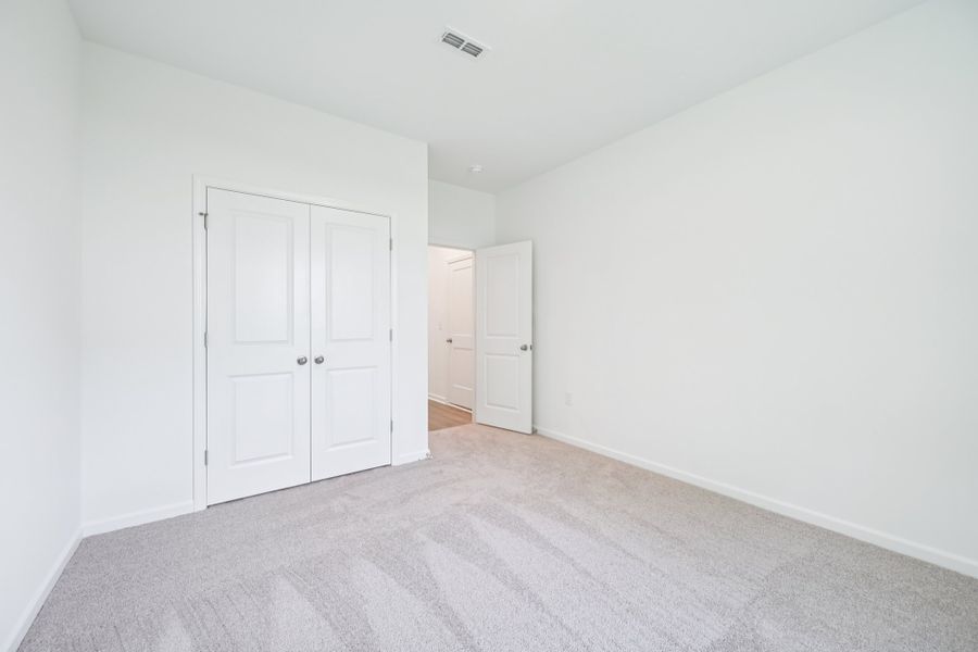 Representative unfurnished interior of a home built from the Meadow by Ashton Woods in Middleton Farms, Middlesex (Image 16).