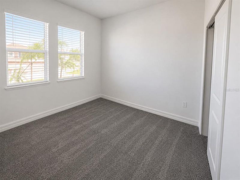 Spacious, unfurnished interior of a new home in Triple Creek: The Executives, Riverview (Image 16).