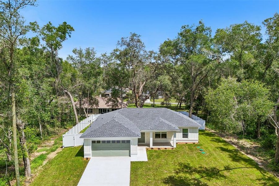 Front exterior of a new home in , Citrus Springs, FL, highlighting curb appeal (Image 22).