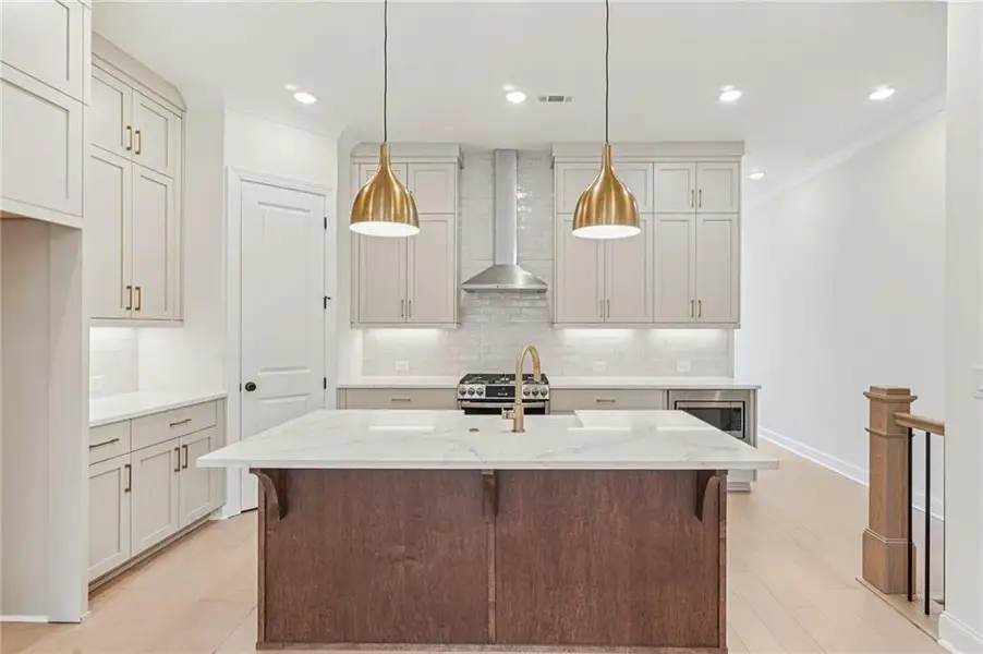 Furnished interior view inside a new home in Ward's Crossing Townhomes, Johns Creek (Image 3).