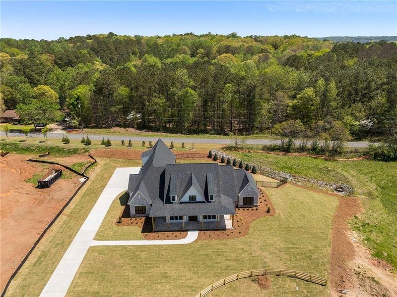 Front exterior of a new home in , Woodstock, GA, highlighting curb appeal (Image 31). Front exterior of a new home in , Woodstock, GA, highlighting curb appeal (Image 31).