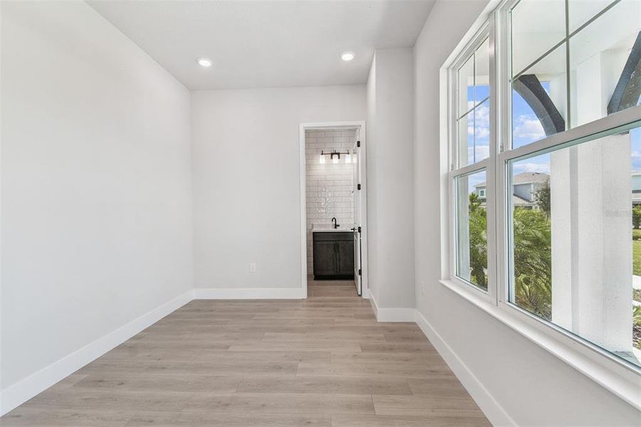 Spacious, unfurnished interior of a new home in Emerald Landing at Waterside at Lakewood Ranch – Cottage Series, Sarasota (Image 25).