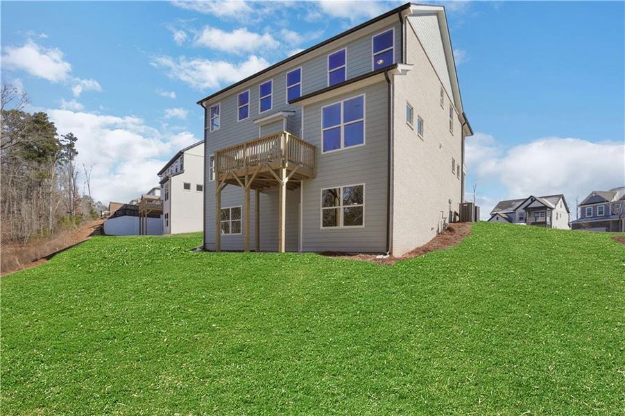 Exterior details and patio area of a home in Cambridge, Flowery Branch (Image 3).