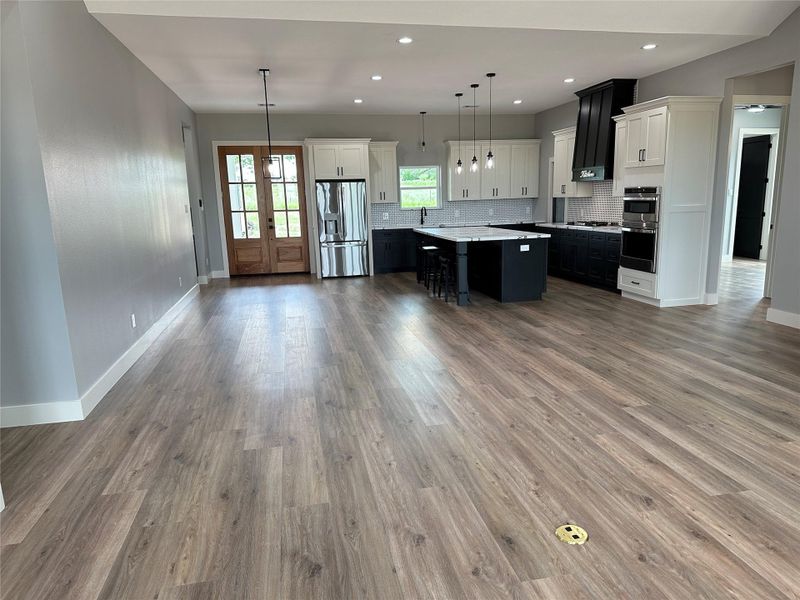 Dining/kitchen combo Office/bonus room to left