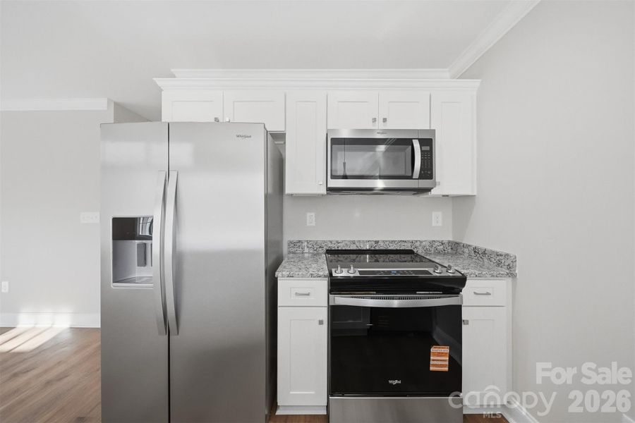 Furnished interior view inside a new home in , Hickory (Image 14).