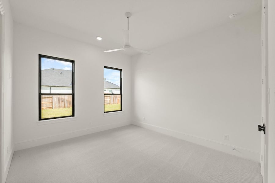 Spacious, unfurnished interior of a new home in The Park and The Reserve, Fulshear (Image 29).