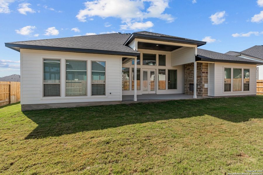 Front exterior of a new home in Mesa Western, Cibolo, TX, highlighting curb appeal (Image 24). Front exterior of a new home in Mesa Western, Cibolo, TX, highlighting curb appeal (Image 24).