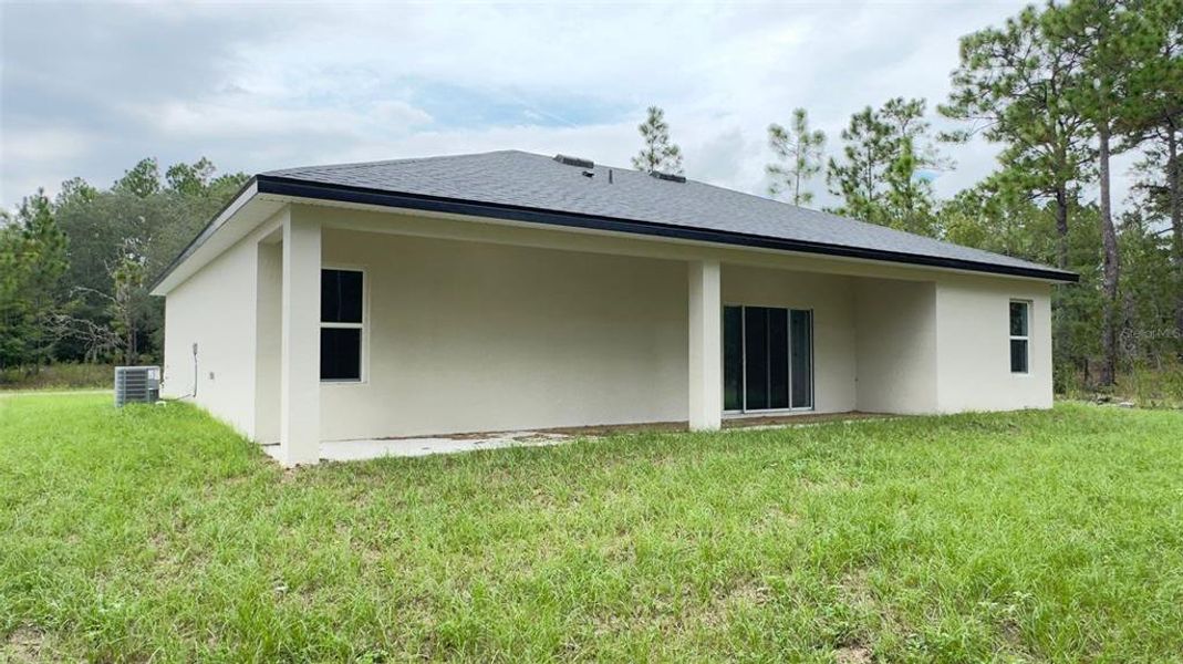 Front exterior of a new home in , Citrus Springs, FL, highlighting curb appeal (Image 14).