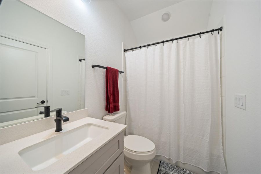 Furnished interior view inside a new home in Mavera, Conroe (Image 9).