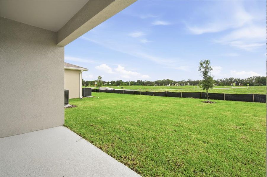 Exterior details and patio area of a home in Estates at Rivers Edge, Parrish (Image 3). Exterior details and patio area of a home in Estates at Rivers Edge, Parrish (Image 3).