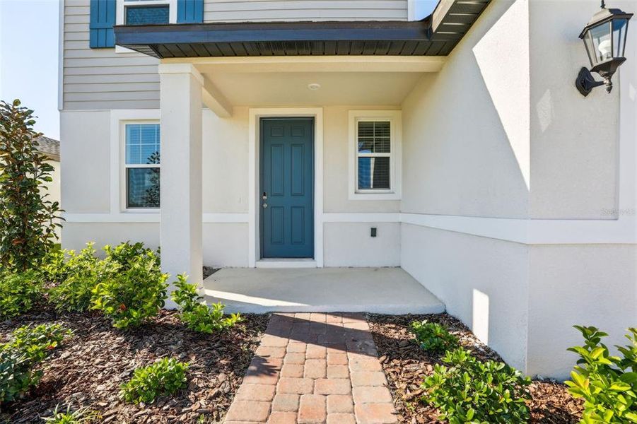 Exterior details and patio area of a home in The Meadow at Crossprairie, St. Cloud (Image 4).