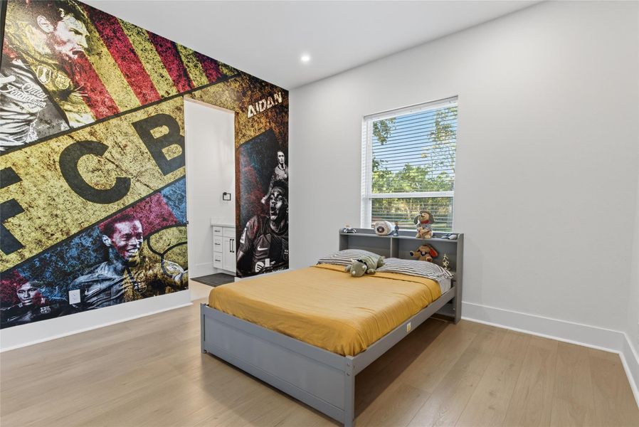 Another secondary bedroom provides comfortable proportions, natural light, and a clean contemporary design. **Images are from a previously completed project. **