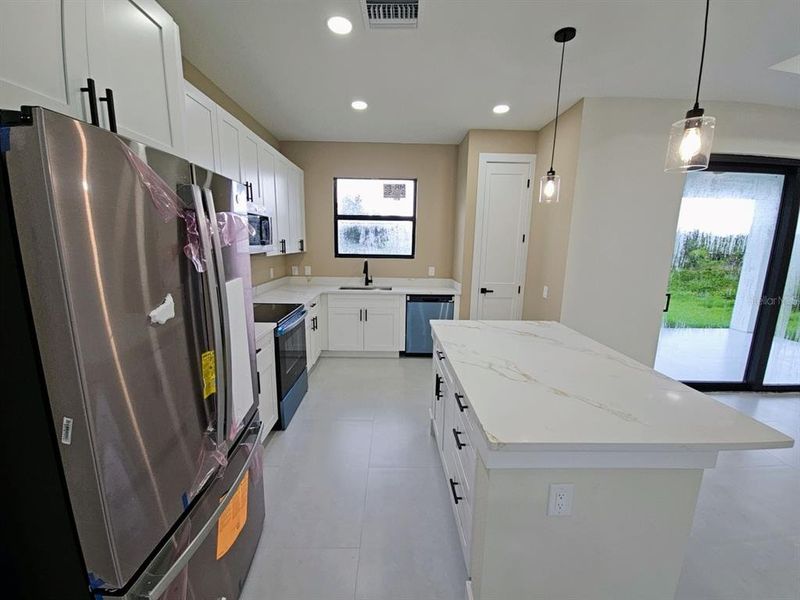 Furnished interior view inside a new home in , Port Charlotte (Image 8).