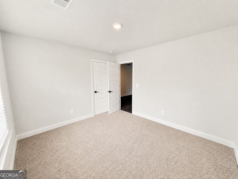Spacious, unfurnished interior of a new home in Harley Farms South, Bonaire (Image 26). Spacious, unfurnished interior of a new home in Harley Farms South, Bonaire (Image 26).