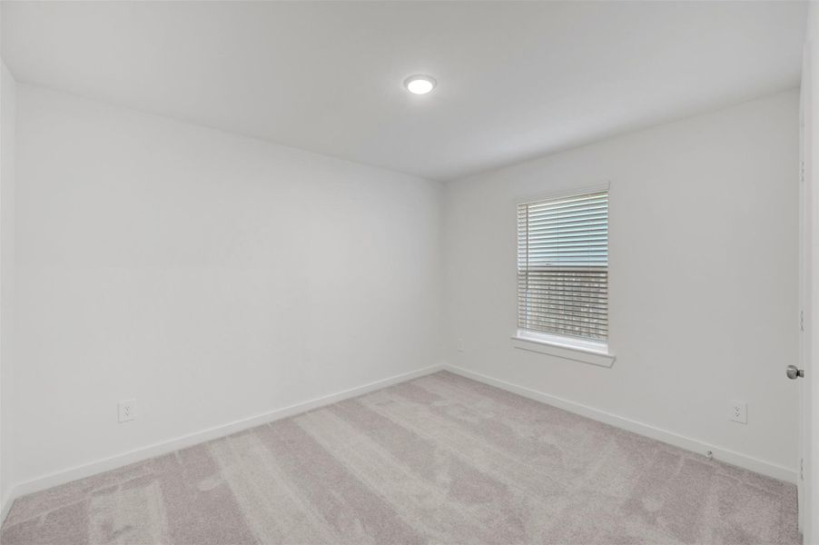Spacious, unfurnished interior of a new home in Pinewood at Grand Texas, New Caney (Image 18).