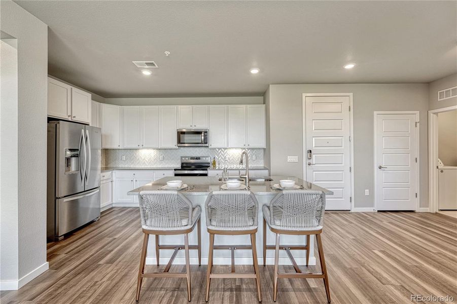 Furnished interior view inside a new home in The Trails at Westcreek, Parker (Image 9).