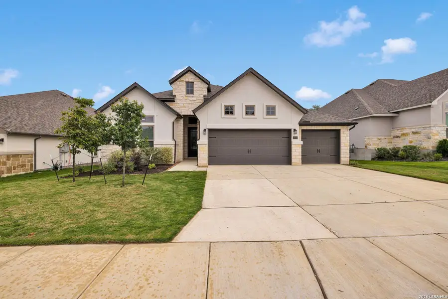 Front exterior of a new home in , Boerne, TX, highlighting curb appeal (Image 23).