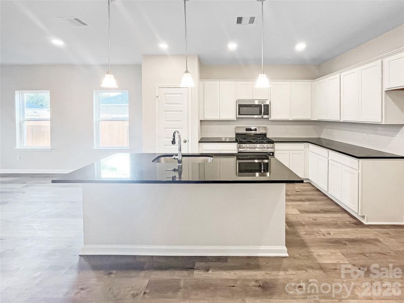 Furnished interior view inside a new home in Sunset Meadows, Charlotte (Image 4).