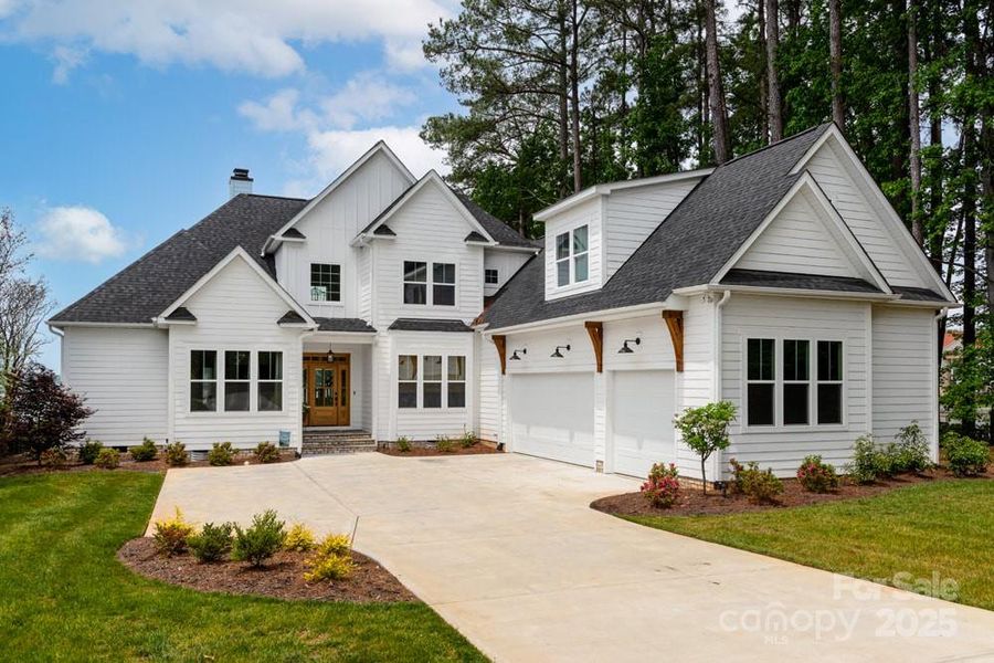 Front exterior of a new home in , Lake Norman of Catawba, NC, highlighting curb appeal (Image 2). Front exterior of a new home in , Lake Norman of Catawba, NC, highlighting curb appeal (Image 2).