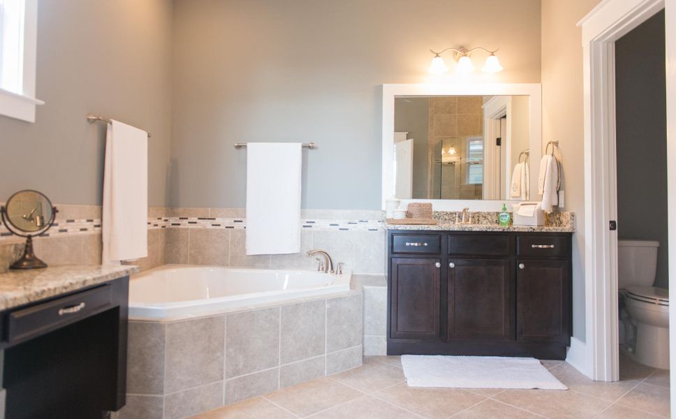 Representative furnished interior of a home built from the Helmsley by Bill Clark Homes in The Sanctuary at Sunset Beach, Sunset Beach (Image 103). Representative furnished interior of a home built from the Helmsley by Bill Clark Homes in The Sanctuary at Sunset Beach, Sunset Beach (Image 103).