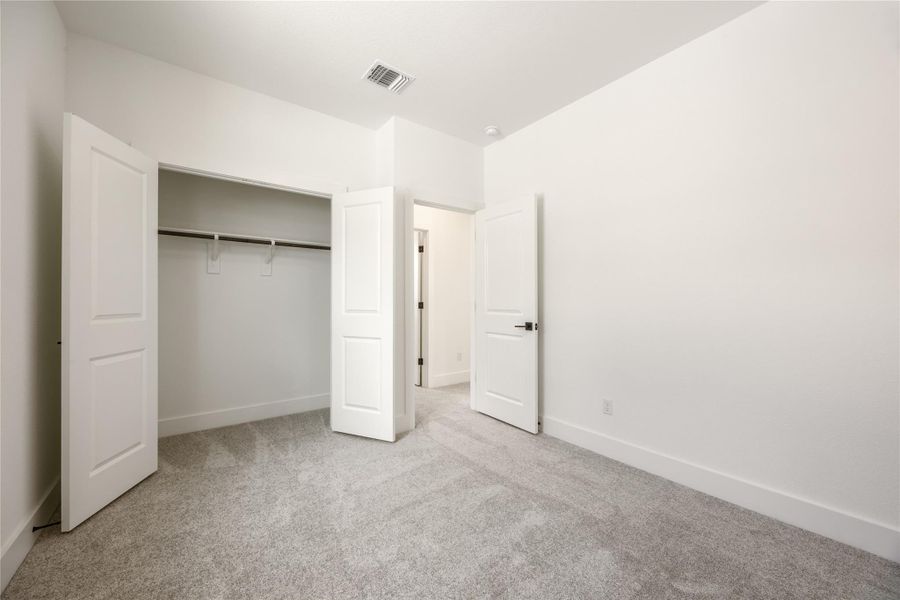 Spacious, unfurnished interior of a new home in Ryegrass Collection – Freedom at Anthem, Kyle (Image 11).