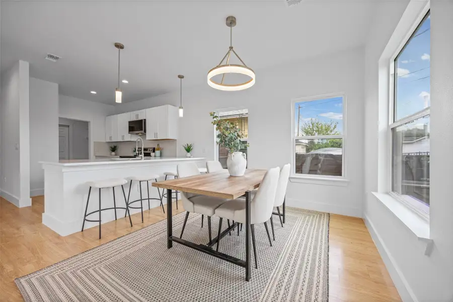 Bright, open-concept living and dining areas offer a seamless flow for entertaining. Bright, open-concept living and dining areas offer a seamless flow for entertaining.
