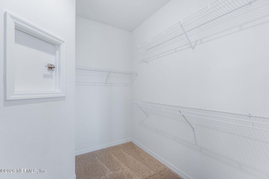 Spacious, unfurnished interior of a new home in Del Webb Wildlight, Yulee (Image 38).