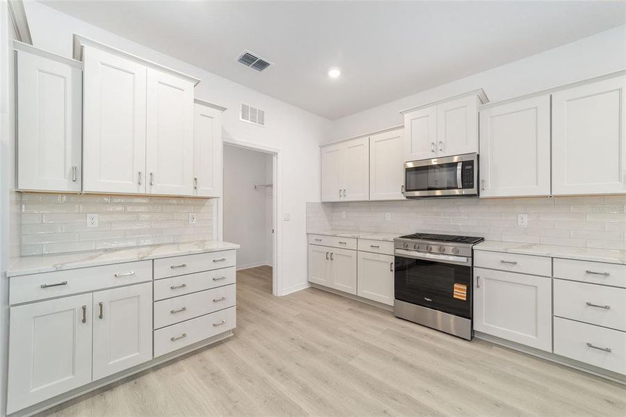 Furnished interior view inside a new home in , Ocala (Image 12).