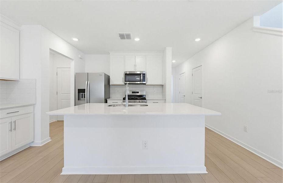 Furnished interior view inside a new home in Vida's Way, Wesley Chapel (Image 4).