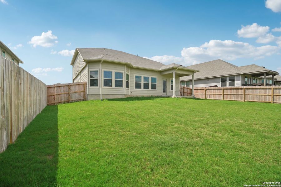 Front exterior of a new home in Legendary Trails - Classic Series, Cibolo, TX, highlighting curb appeal (Image 26). Front exterior of a new home in Legendary Trails - Classic Series, Cibolo, TX, highlighting curb appeal (Image 26).